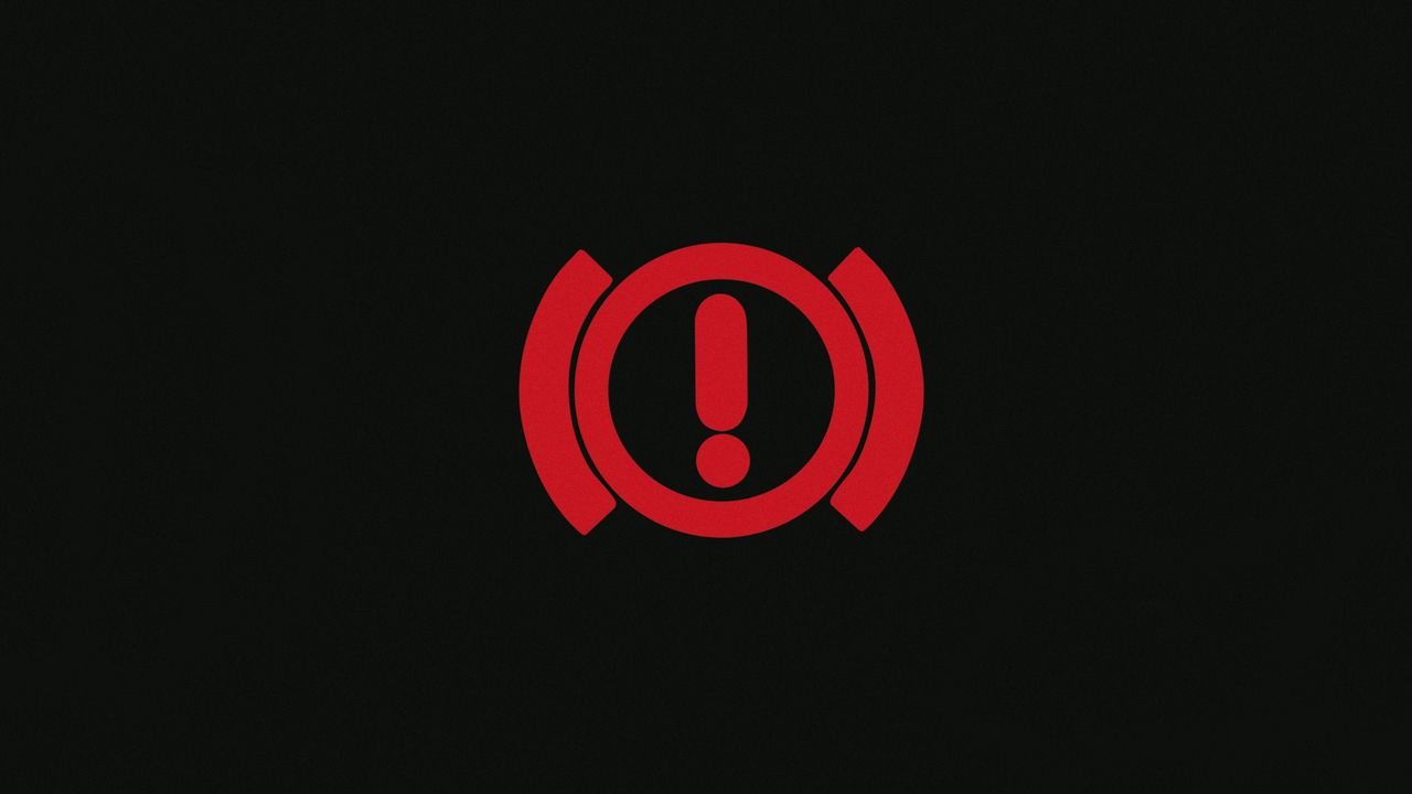 Ein Rufzeichen in einem Kreis bei einer roten Kontrollleuchte.